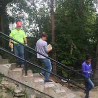 <p>Bronxville students were tasked with carrying concrete mix and dirt throughout the work site in Yonkers.</p>