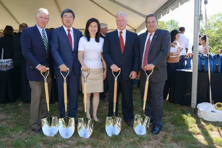 From left, Arthur Collins, president of Collins Enterprises; Ning Yuan, chairman/CEO of Strategic Capital; Yi Lui, commercial counselor, Consulate General of China; Dwight Collins, principal of Collins Enterprises; and Yonkers Mayor Mike Spano.