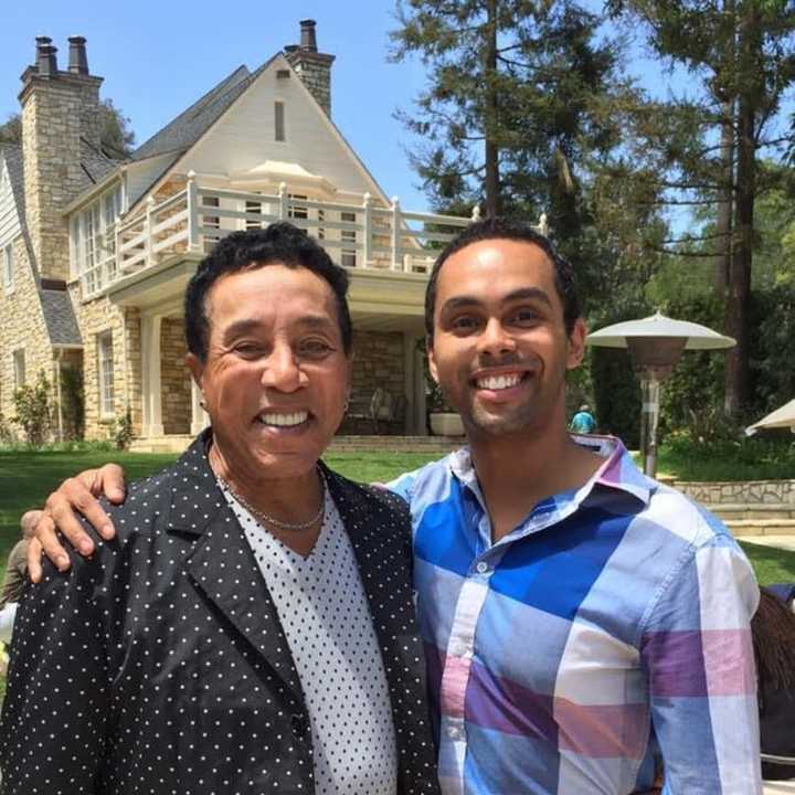 Jesse Nager, left, and Smokey Robinson at the home of Barry Gordy Jr. in Beverly Hills.