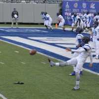 <p>Passaic Tech football players get loose before the state finals game against Ridgewood Saturday, Dec. 5. </p>