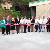 <p>Eastchester town and library officials unveiling the brand new reading courtyard.</p>