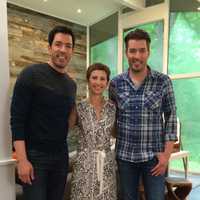 <p>Larchmont Designer Kim Mitchell, center, with &quot;The Property Brothers.&quot;</p>