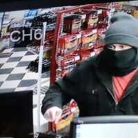 <p>Ashby Police are seeking to identify this man, who robbed a convenience store at knife-point Sunday night, Jan. 1.</p>