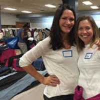 <p>Many volunteers helped make a teen shopping boutique.</p>