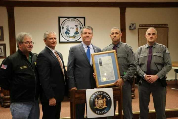 From left, Yorktown Councilman Ed Lachterman, Yorktown Supervisor Michael Grace, Sen. Terrence Murphy, Trooper Avery Katz and Trooper Gregory Maxwell are shown at Yorktown Town Hall on Dec. 15.