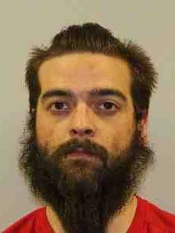 Fugitive Nabbed With Stolen Gun, Drugs In Putnam Traffic Stop