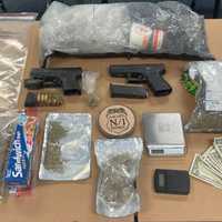 Large Amount Of Suspected Drugs, Guns, Seized From Two Maryland Men During Stop: Police