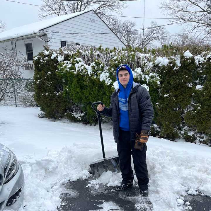 Snow Angel Joey Belarge helping out a senior in need.