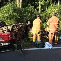 <p>Two men were injured in a two-car rollover crash in Milan.</p>