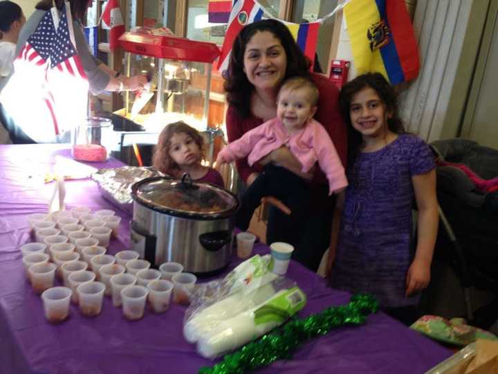 Anna Salerno with her daughters Bella, Amelia and Alexandra at her school&#x27;s International Night Food Fair with hundreds of meatballs.