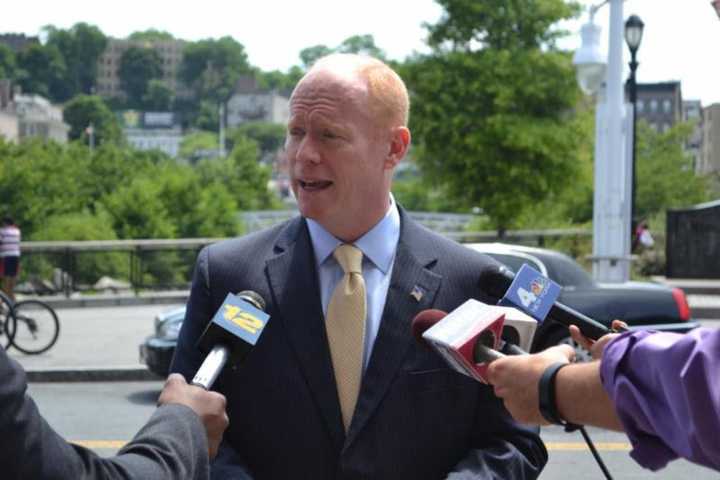 Yonkers City Council President Liam McLaughlin arrives at the Yonkers Metro-North station after having taken the inaugural Uber ride in Westchester.