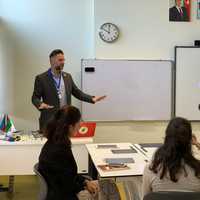 <p>New Rochelle High School English teacher Anthony Stirpe leads a workshop at the International School of Azerbaijan in Baku, Azerbaijan.</p>