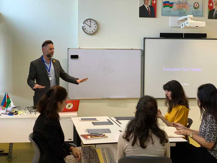 New Rochelle High School English teacher Anthony Stirpe leads a workshop at the International School of Azerbaijan in Baku, Azerbaijan.