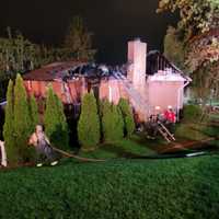 Dog Rescued As Homeowners Escape Fast-Moving Attic Fire In Maryland