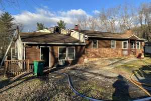 Firefighter Injured Battling Tricky Two-Alarm Maryland House Fire