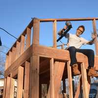 <p>Matthew Olson works on his tiny house.</p>