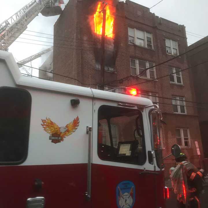 The fire broke out late Sunday afternoon at the four-story apartment building in Yonkers.