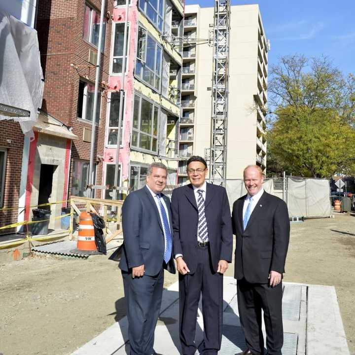 Yonkers Mayor Mike Spano with developers from Ginsberg Development Companies outside of the River of Tides at Greystone at the topping off ceremony.