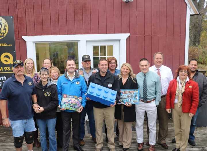 Orange County officials gathered to kick off the second annual Toys for Tots campaign.