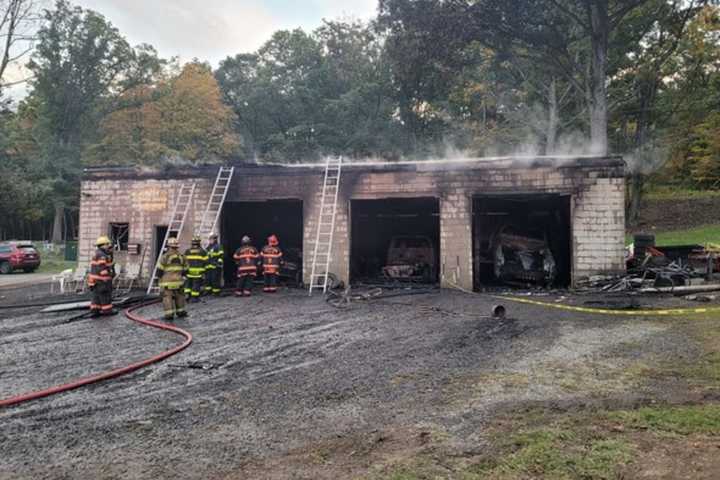 Several Cars Destroyed In Three-Bay Maryland Garage Fire, Officials Say