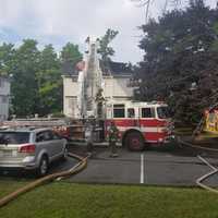 <p>Danbury firefighters wrap up following a three-alarm fire.</p>