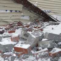 <p>One resident was displaced after the facade of an apartment complex came apart.</p>