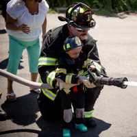 <p>Diego gets to train a hose.</p>