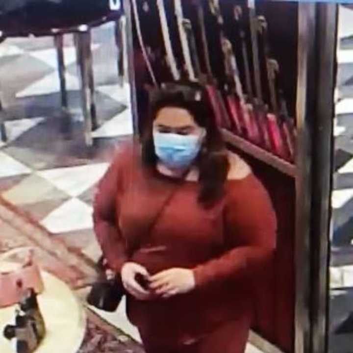 A woman is wanted after allegedly stealing a wallet from the Gucci store at the Walt Whitman Mall.