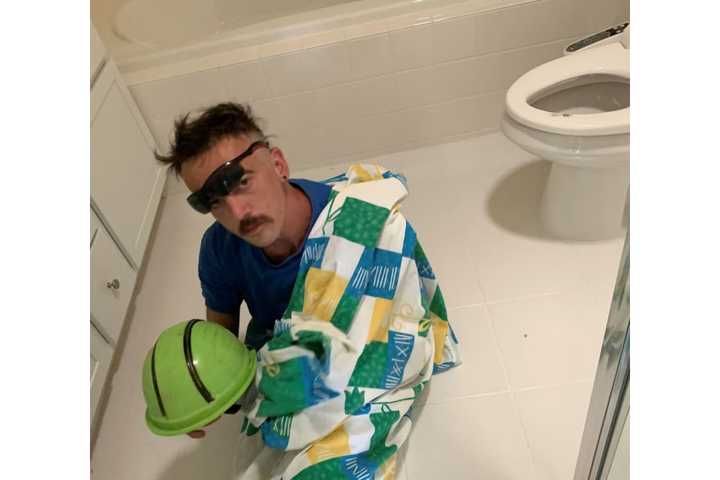 Police Seek To ID Stranger Found Sleeping In Bathroom Of Long Island Condo