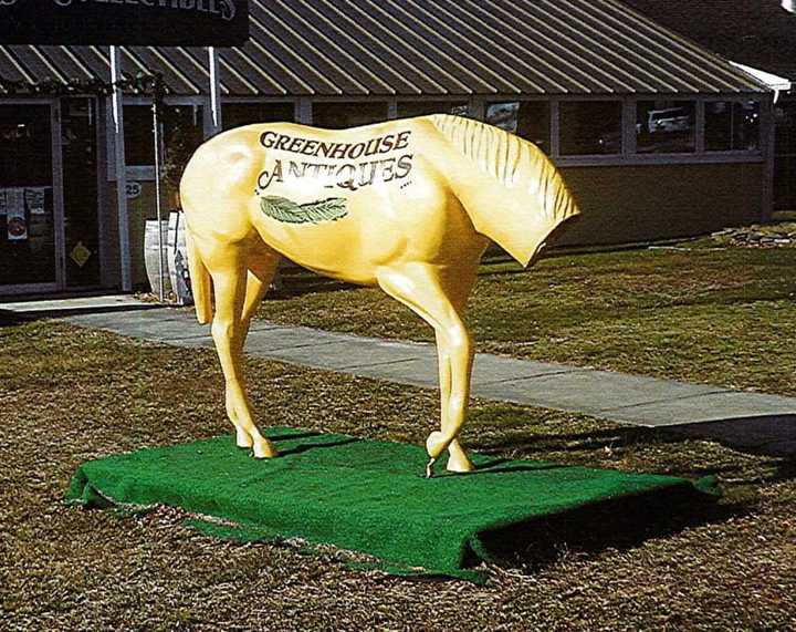 Police in Suffolk County are attempting to locate the people who broke a horse statue in St. James.