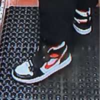 <p>Nike sneakers worn by the robber.</p>