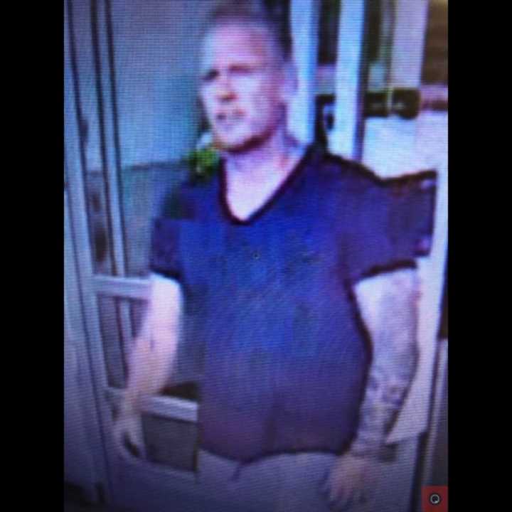 This man is not charged with a crime, but police in Bucks County are looking to speak with him about a retail theft.