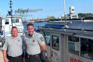 WATCH: Boston Harbor Police Pull 2 Men From Water Moments From Drowning