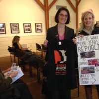 <p>Lisa Boyne, right, meets with state Rep. Cristin McCarthy Vahey at a League of Women Voters meeting.</p>