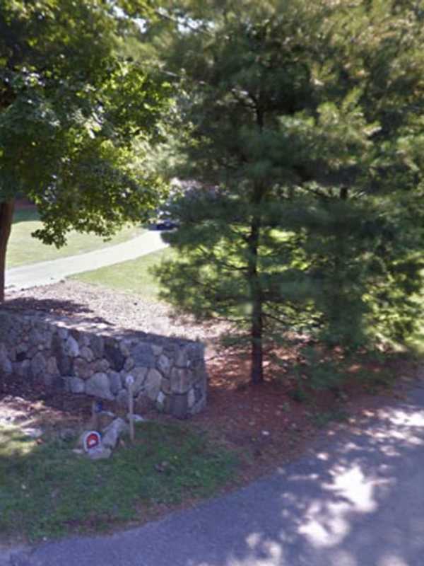Driver Hospitalized After Slamming Into Pole, Stone Wall In Weston