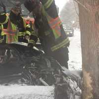 Car Goes Off The Road, Tractor Catches Fire On Snowy Day In Monroe