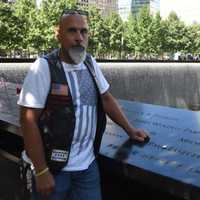 <p>Renegade Pigs North Jersey Chapter founder/past president Les Goldstein, a retired Clifton police officer, at the WTC Memorial.</p>