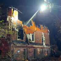 <p>The fire on Hillside Avenue in Upper Saddle River was officially declared under control around 8 p.m., but firefighters continued to douse hot spots.</p>