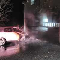 Car Fire Leaps Onto Westport Home Causing Major Damage To Garage