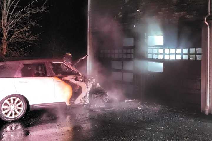 Car Fire Leaps Onto Westport Home Causing Major Damage To Garage