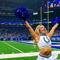 <p>MacLaine Fusch cheers for the Colts.</p>