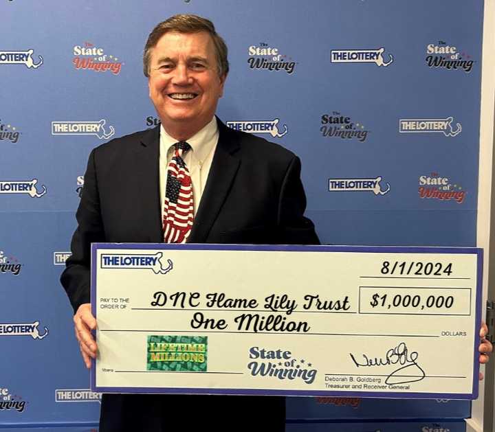 Attorney David Spillane, a representative of DNC Flame Lily Trust of Quincy, collected the check for the winner.&nbsp;