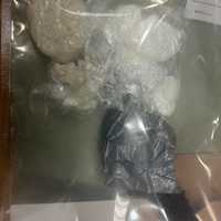 <p>The recovered drugs and paraphernalia. </p>