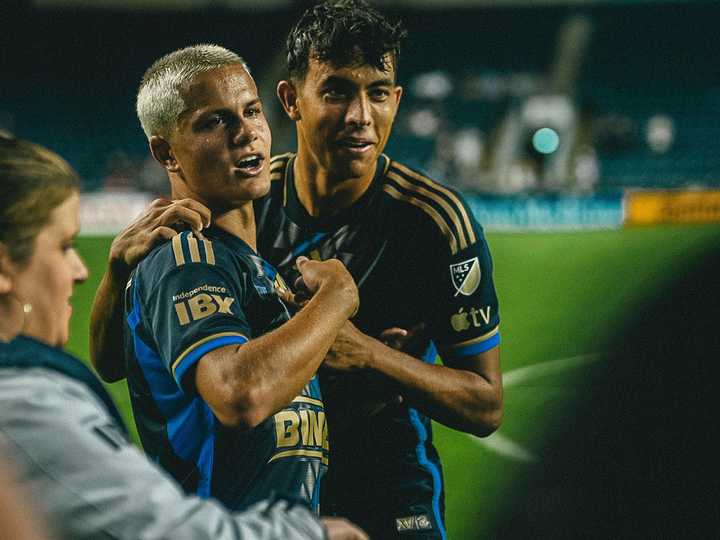 Cavan Sullivan with his brother, Quinn, just after making his debut as the youngest player to enter an MLS match.