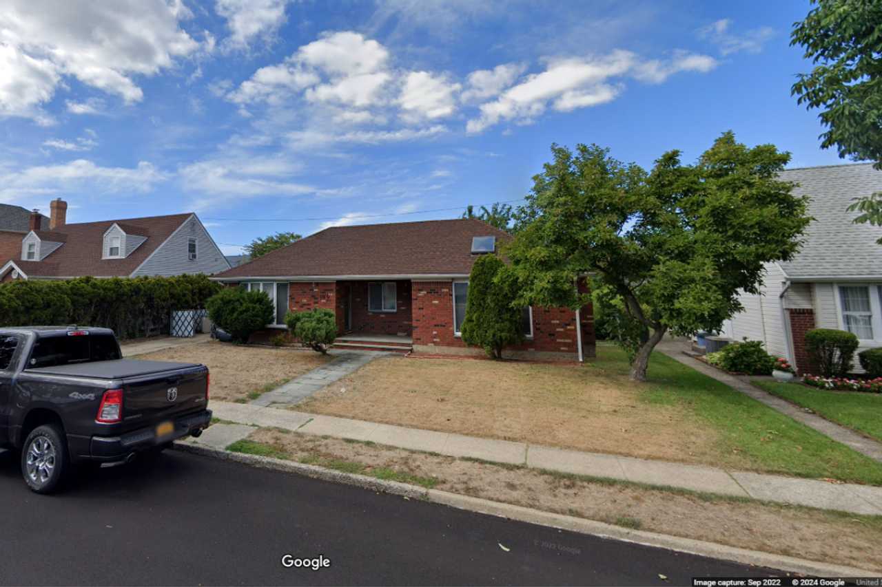 5 Pit Bulls, 3 People Caught Squatting At Long Island Home, Police Say