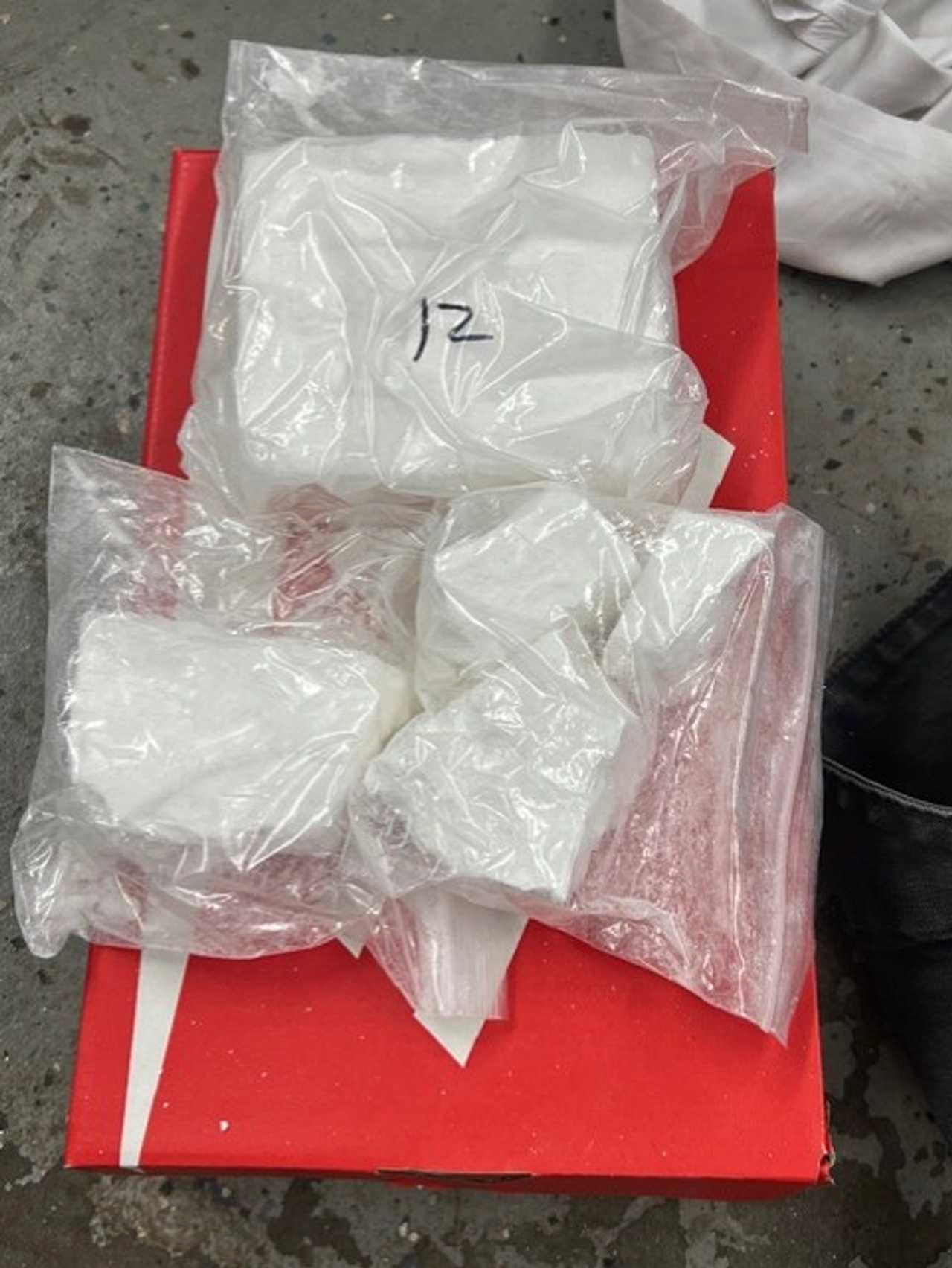 The kilo of cocaine found hidden under Christmas lights in Quida Martens and Toya Kennedy's car — along with a young child, the Pennsylvania Attorney General says. The kilo of cocaine found hidden under Christmas lights in Quida Martens and Toya Kennedy's car — along with a young child, the Pennsylvania Attorney General says.