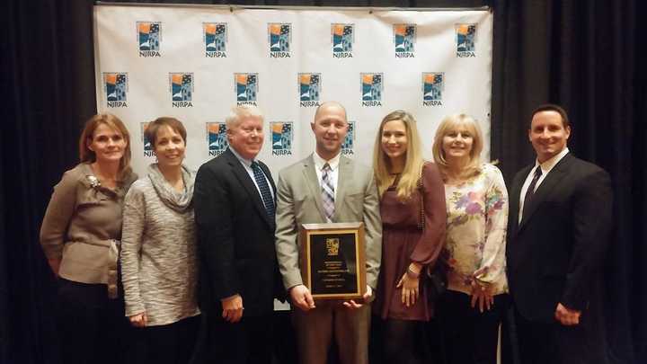 Brick Recreation Director Dan Santaniello, center, wins&nbsp; Professional of the Year Award from the New Jersey Recreation &amp; Park Association in 2016.