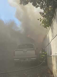 Firefighters Battle Blaze At Norwalk Garage Repair Shop