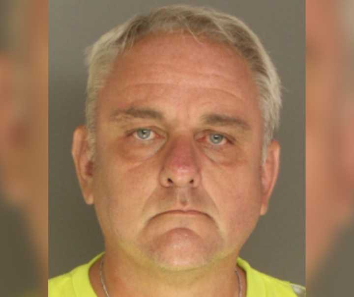 Donald Alleman is accused of road rage against a bicyclist after officers saw a video of him allegedly using his pickup to force the rider off the road, according to a police release.