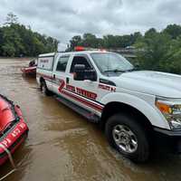 <p>Boats being launched for the water rescue in Conestago Creek.</p>